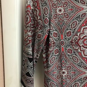 Knee length 3/4 sleeve dress.